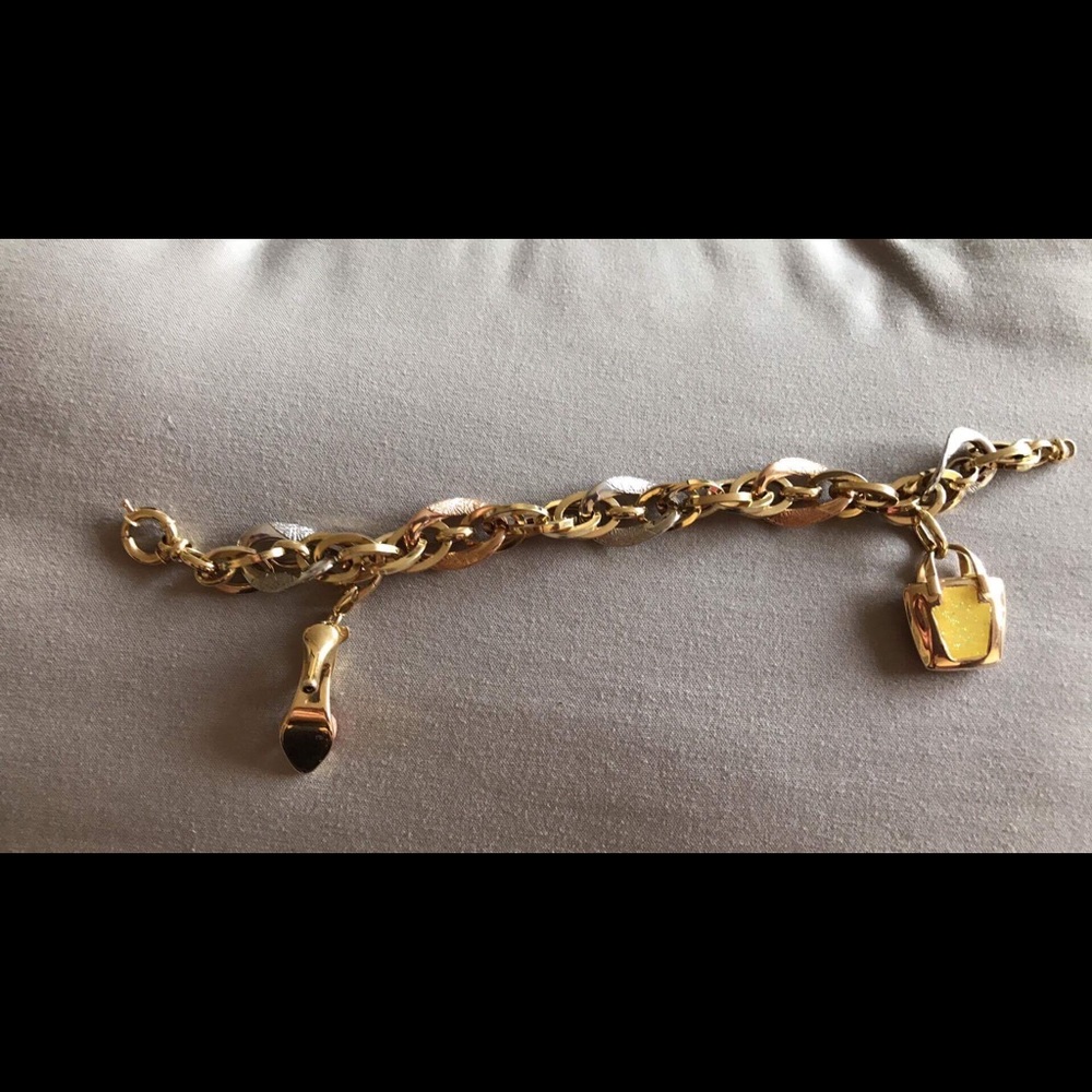 3tone 18k gold change bracelet...